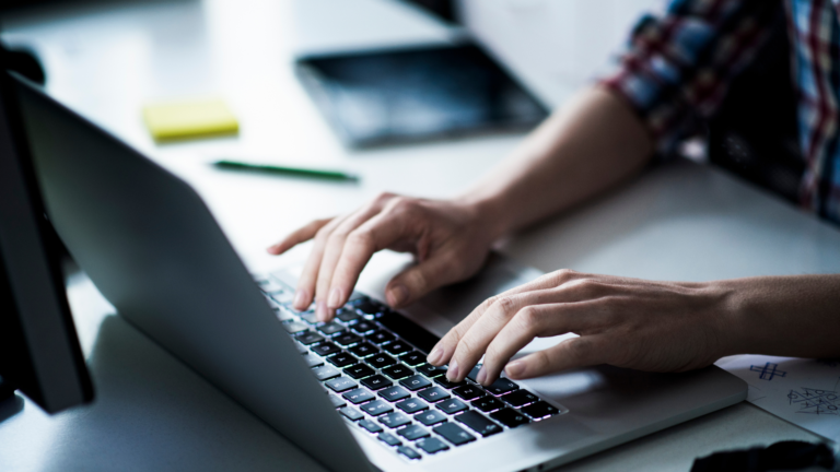 someone typing on a computer